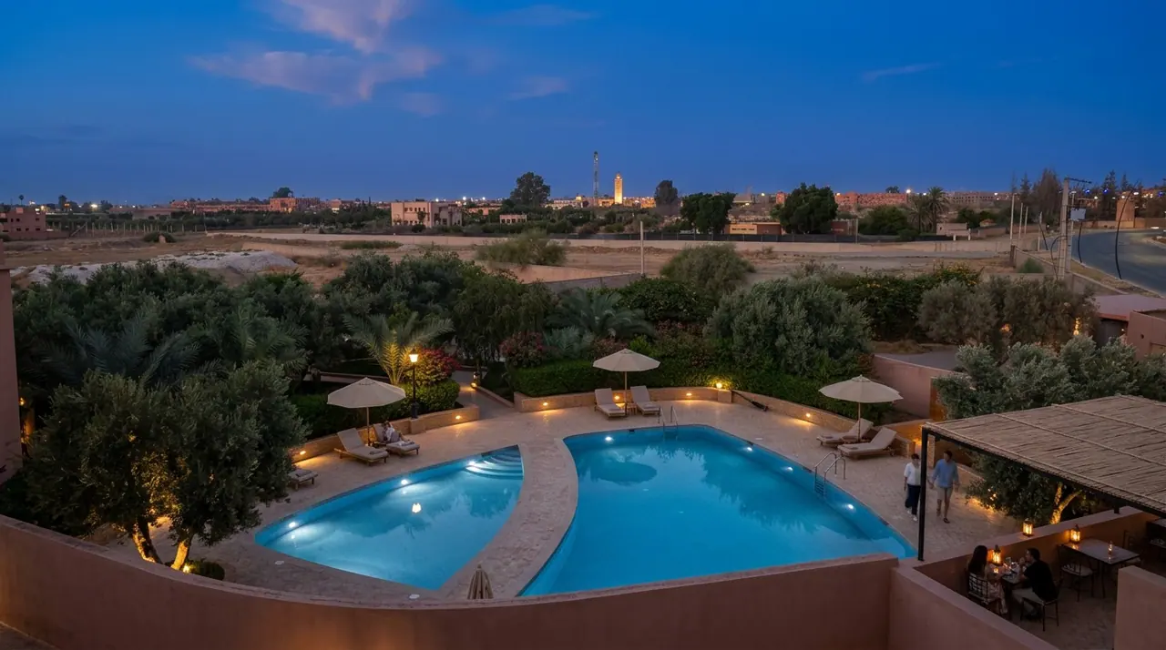 The pool and garden of La Coupole Rouge at dusk